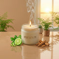 PRESENTE Taller Artesanal Alba No. 2 candle with bergamot and sandalwood. Cream wax in glass jar with lit flame.